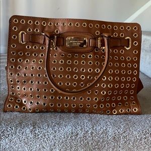 Micheal Kors grommet brown bag